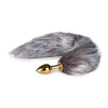 Kleine goudkleurige buttplug met bruin/witte vossenstaart Kleine goudkleurige buttplug met bruin/witte vossenstaart