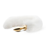 Kleine goudkleurige buttplug met witte vossenstaart Kleine goudkleurige buttplug met witte vossenstaart